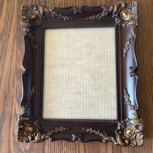 Ornate picture frame with glass
